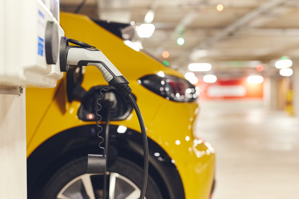 Electric car charging in car park
